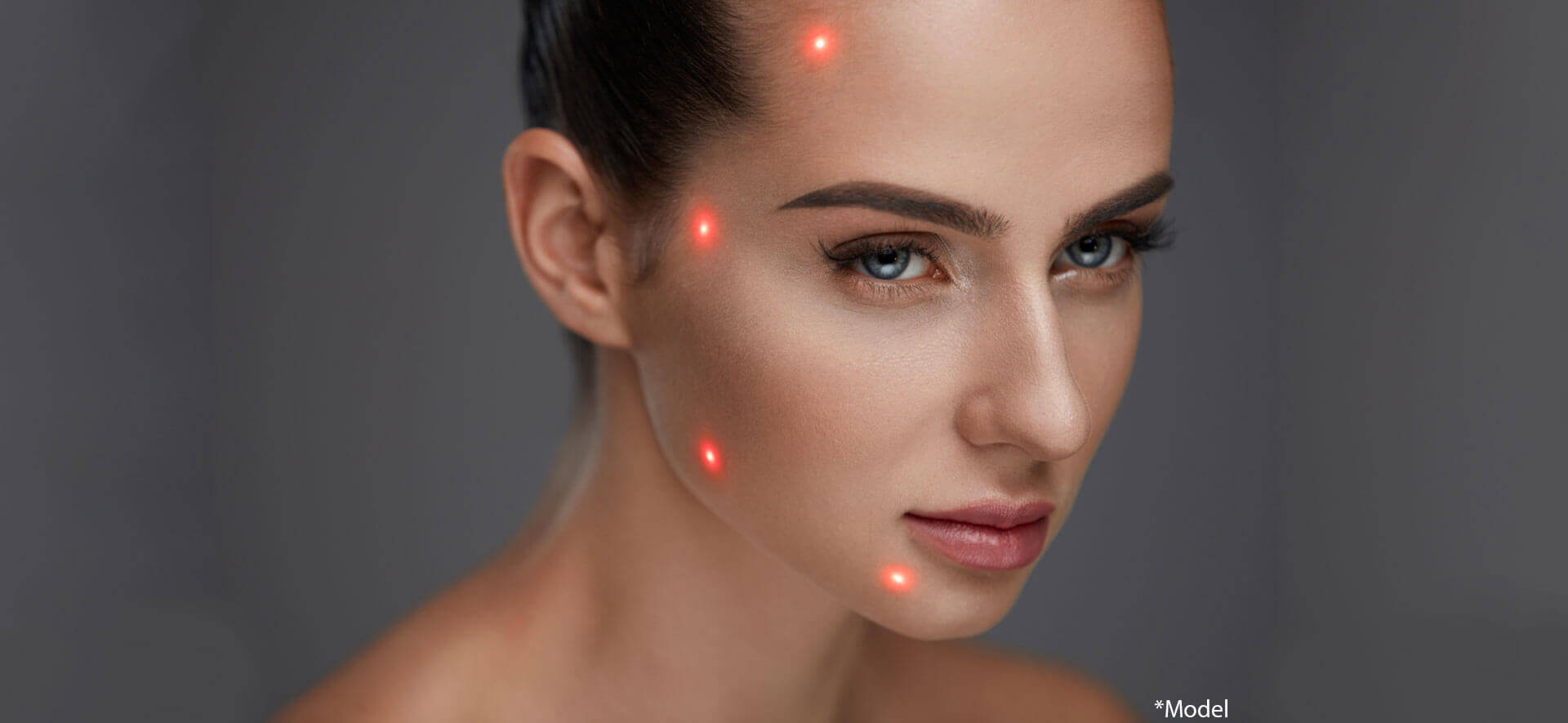 Portrait of girl before plastic surgery with laser marks on facial skin